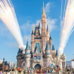 cinderella's castle with fireworks in the background