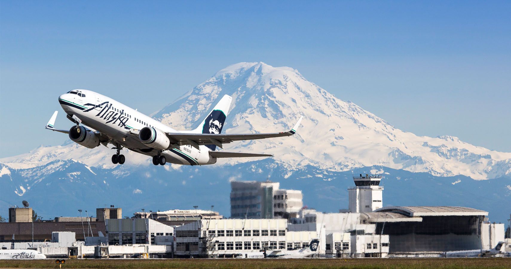 O aeroporto de Seattle permitirá em breve que amigos e familiares passem pela segurança pela primeira vez em 17 anos 1 O aeroporto de Seattle permitira em breve que amigos e