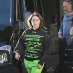 Billie Eilish arriving at the airport wearing sweatpants