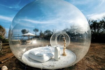 camping inside a bubble tent
