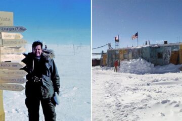 a man takes a photo next to the vostok sign, the vostok station in antarctica