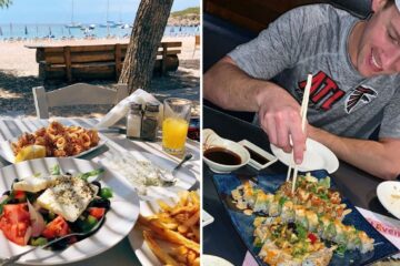 eating greek food on the beach, a guy eats sushi