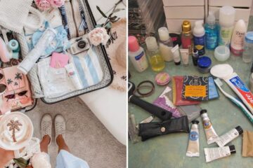 a pink aesthetic of a packed suitcase, all the essential toiletries