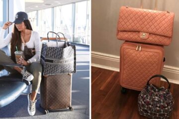 a woman waits in the airport with her luggage