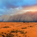 a dust storm moves across the sahara