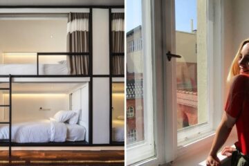 a nice hostel in europe, a girl takes a photo near a window in berlin