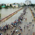 a major highway in india is flooded after heavy rains