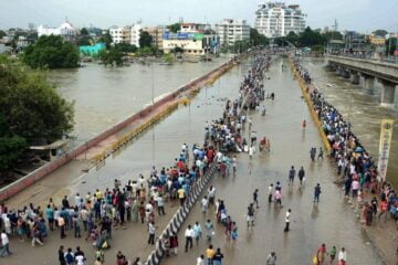 a major highway in india is flooded after heavy rains