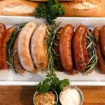 a plate full of german bratwurst