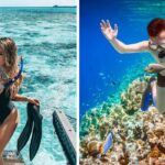 a woman walks up the boat stairs after snorkeling, a man snorkels near coral and watches tropical fish