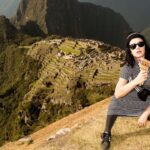 Katy Perry posing with Machu Picchu in the background