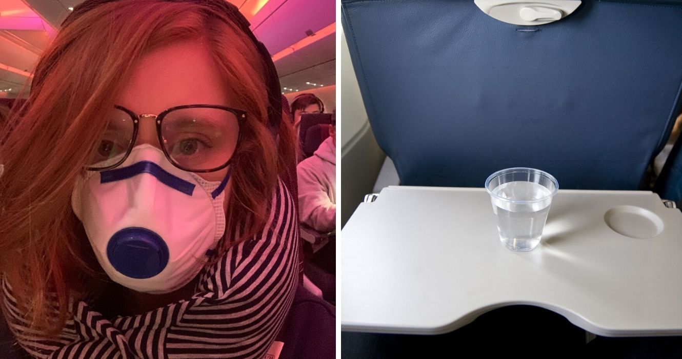 uma garota usa uma máscara facial em um avião, um copo d'água em uma bandeja de avião