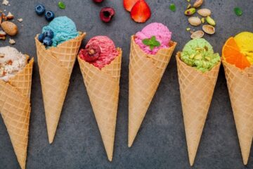 a variety of ice creams in cones